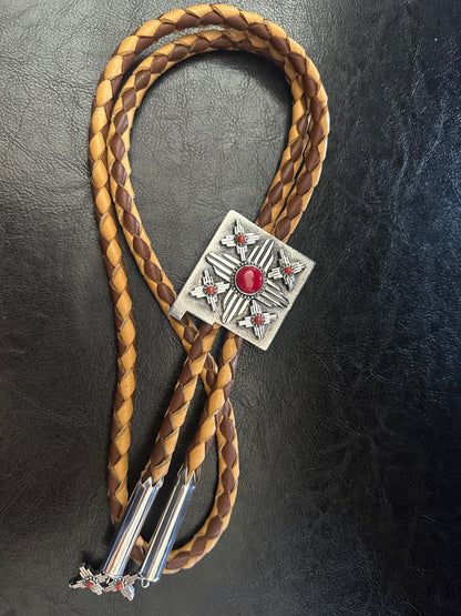 Shane Casias handmade sterling silver Zia bolo tie with Mediterranean red coral and Rosarita stone centerpiece